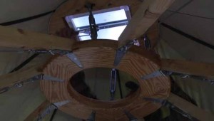 Interior detail of top center support ring in a tiny yurt home called a Yome by Red Sky Shelters