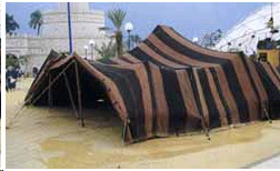A black and tan striped nomadic tent