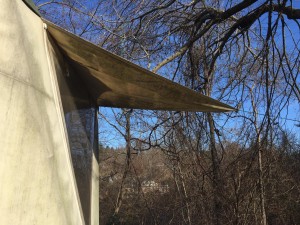 Detail photo of exterior of a well-aged Yome tent home showing fabric coloration