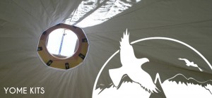 Interior detail of fabric roof of Yome yurt home with graphic logo elements overlay and text reading Yome Kits